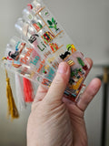 Bookshelf Bookmarks with black cats pink, green and yellow tassels